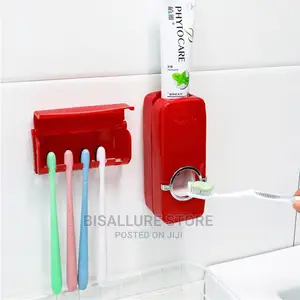 Red Toothbrush Holder And Paste Dispenser