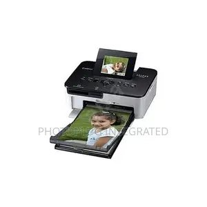 Canon Selphy Cp1000 Photo Printer + 1 Pack Of Canon Paper