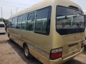 Toyota Coaster 2015 Gold