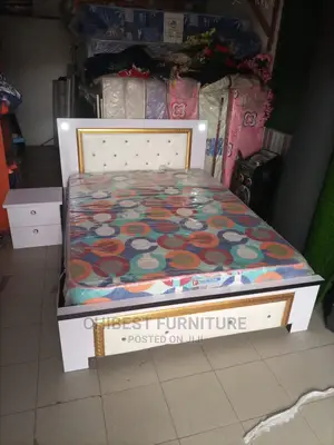 Quality Wooden 4.5by6 Bed With One Side Drawer.