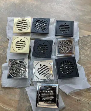 Stainless Steel, Gold and Black Floor Drain