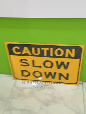 Caution Slow Down Pedestrian Traffic - Safety Sign
