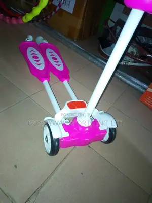 Children Riding Scooters