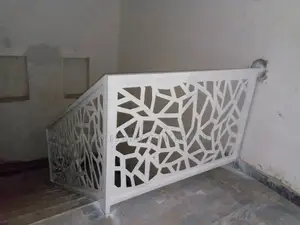 White Laser-Cut Designs for Staircase