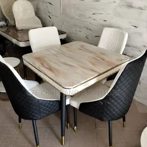 By 4 Seaters Leather Chair and Marble Dining Table