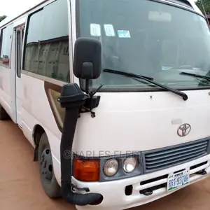 Sharp Coaster Bus at Your Service