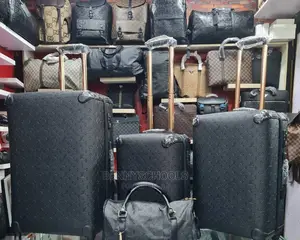 Set of 4 Imported Black Luis Vuitton Traveling Luggage Boxes