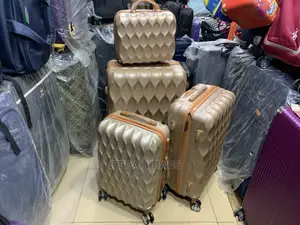 Set of Gold Color Quality Plastic Traveling Luggage With Kit