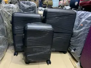 Set of Black Unbreakable Plastic Traveling Luggage