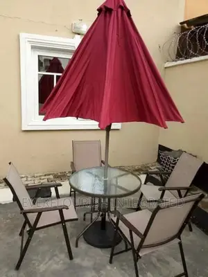 Outdoor Table, 4 Chairs and Umbrella