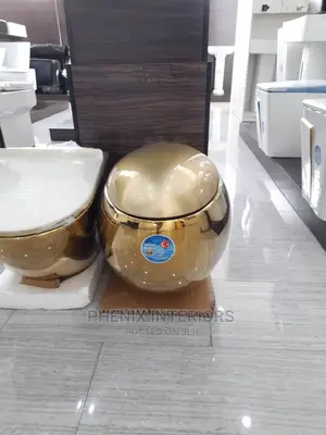 Egg Shaped Gold Wall Hung Concealed Water Closet