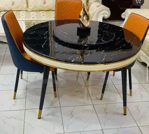 Round Royal Dining Table by 6 With Six Leather Chairs.