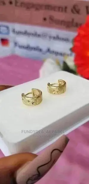 Female Gold Clip on Earrings