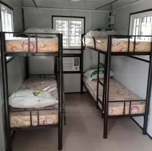 A Double Bunk Bed With 2 Mattresses