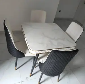 Luxurious Marble Top Dinning Table With Four Leather Chairs