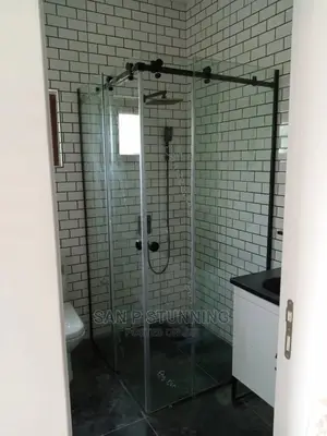Transparent Shower Cubicle With Black Accessories