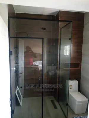 Classic Shaded Glass Shower Cubicle Design.