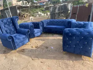A Standard Chesterfield Sofa With Royal Chair