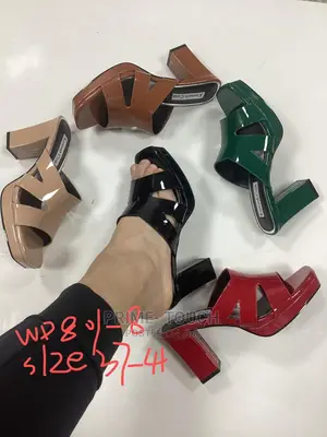 Low Wedge Slippers.