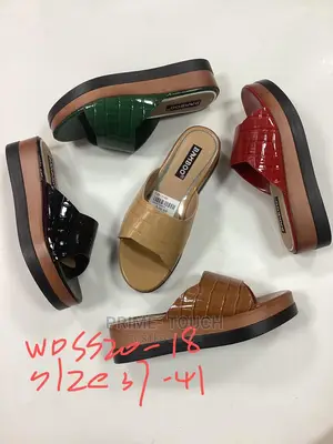Low Wedge Slippers.