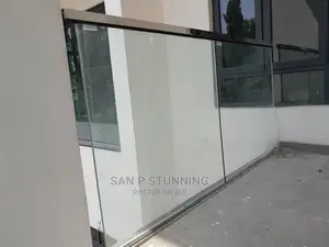 Executive Glass Railing With Frameless Design.