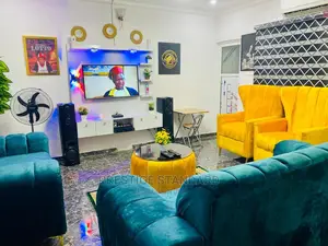 A Standard Living Room Sofa With Center Table