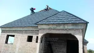 Patched Shingle Stone Coated Roof Installation by Classy