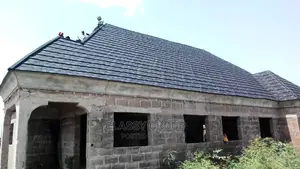 Patched Shingle Stone Coated Roof Installation by Classy