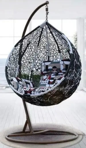 Quality Indoor/Outdoor Rattan Made Hanging Swing Chair.