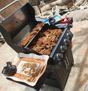 4 Burner Barbecue Grill With Side And Cupboards