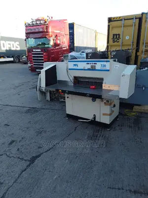 Electric Paper Cutting Machine.