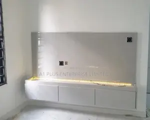 Gray Mini Tv Wall Pannel With Console and Lighting