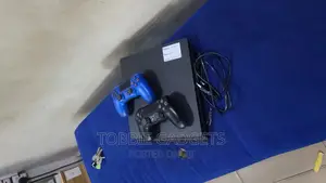 Uk Used Playstation 4 Slim With 2 Pads And 9 Games