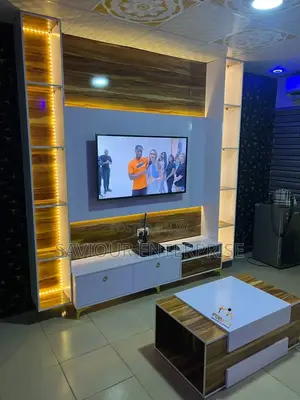 Tv Stand With Wall Frames and Center Table