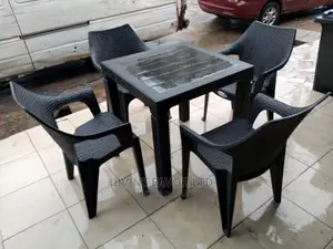 A Set of Plastic Table and 4 Chairs for Restaurant.