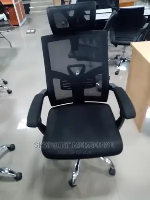 An Executive Office Swivel Chair With Headrest