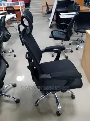 An Executive Office Swivel Chair With Headrest