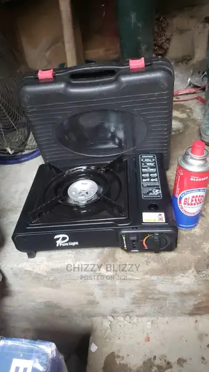 Portable Camping Gas Cooker With Extra Refilling Gas.