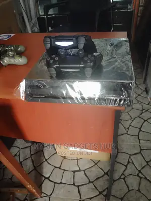 Super Neat UK Used Ps4 Pro With Original Accessories