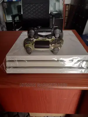 Sparkling White and Super Grade Ps4 Pro With 10 Games