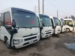 Premium Coaster Bus for Rent
