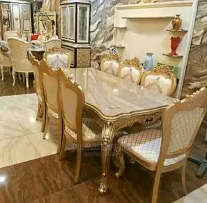 Wooden Top Royal Dinning Table With Eight Sitter Chairs