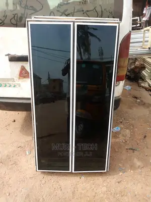 White Casement Framless Window With Black Glass