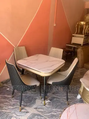Luxurious 4 Seater Marble Top Dining Table With Chairs.