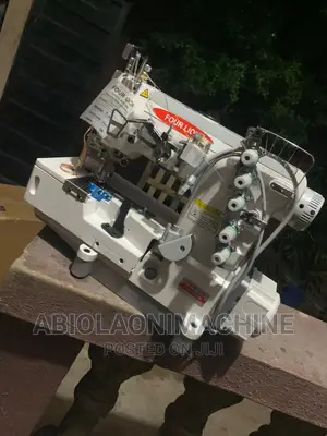 Four Lion Direct Drive Taping Machine Flat Cover Stitch