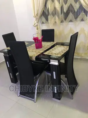 Glass Dining Table With Four
Chairs