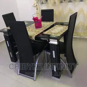 Glass Dining Table With Four
Chairs