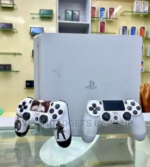 Playstation 4 Slim White Color With 2 Pads 12 Solid Games