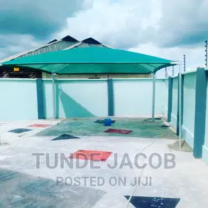 Carport Made With Galvanized Pipes and Waterproof Net