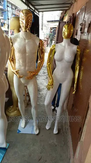 Male and Female White and Gold Mannequins